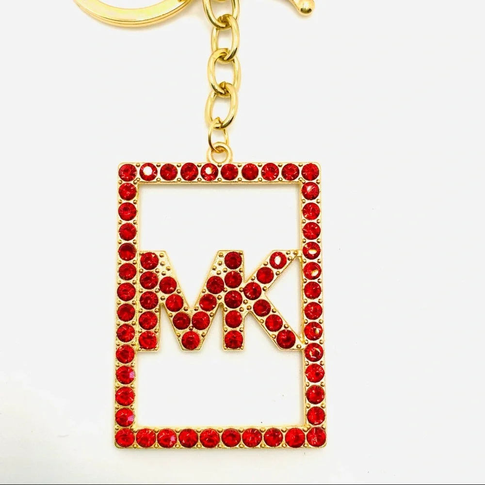 Purse Charm Key Chain MK in Red Crystals set in golden tone.